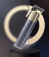 MAQUINA CORTADORA PARA CABELLO KEMEI NEGRA CON DORADO- OMC-483